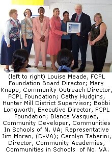 Representative Moran honored for support of Literacy Outreach Program.